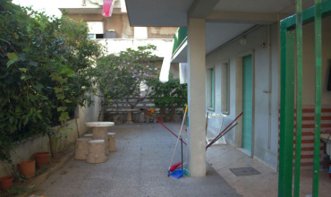 Wohnung am Meer mit Garten und Innenhof